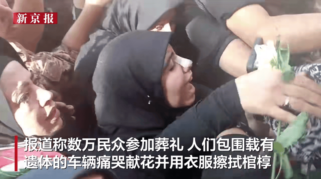 皇冠登1登2登3出租_伊朗国葬现场：数万民众参加葬礼皇冠登1登2登3出租，围着灵车痛哭并用衣服擦拭棺椁，还有民众高呼“美国去死”