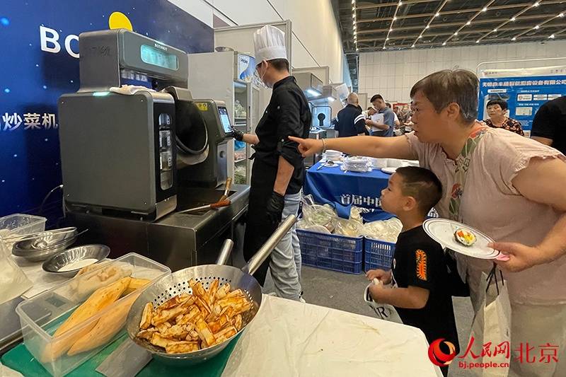 意大利甲组联赛 _北京平谷举办炒菜机器人大赛 加速布局食品营养新赛道